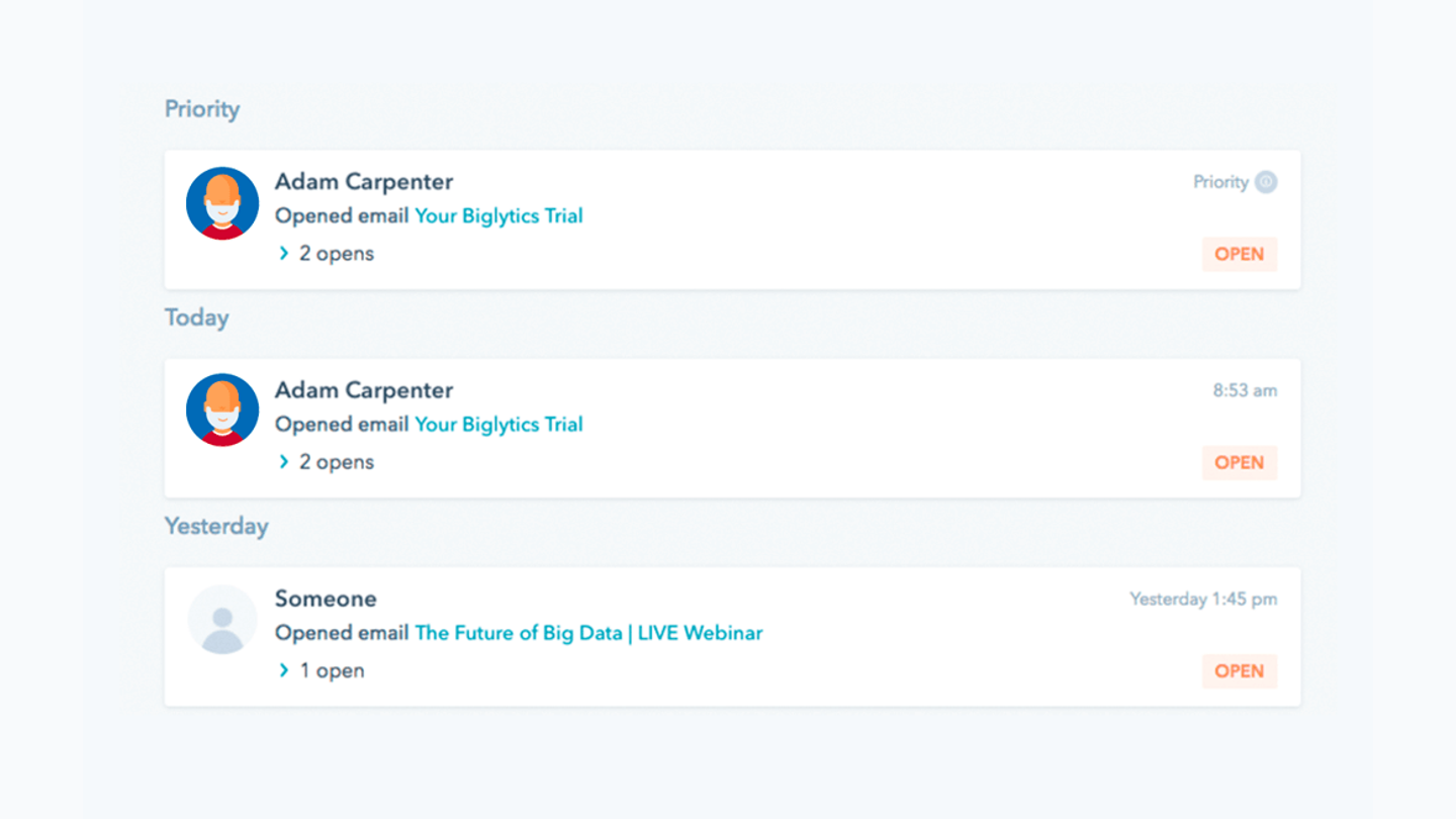 HubSpot Sales Hub activity feed showing tracked email opens for CRM contacts